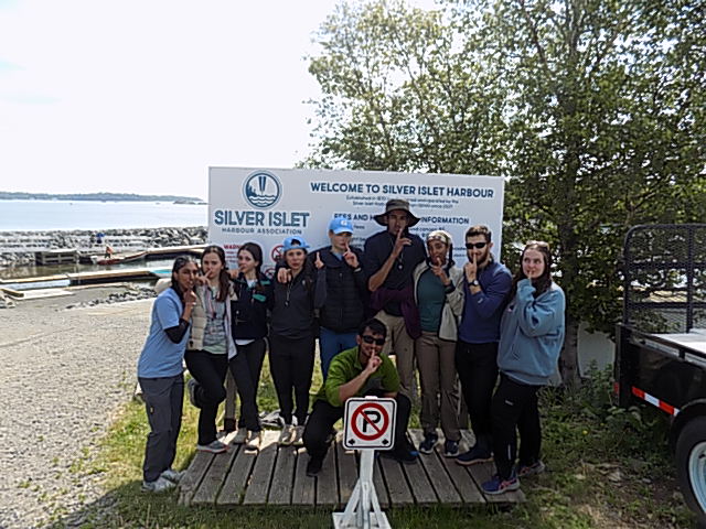 The group at Silver Islet Harbour sign
